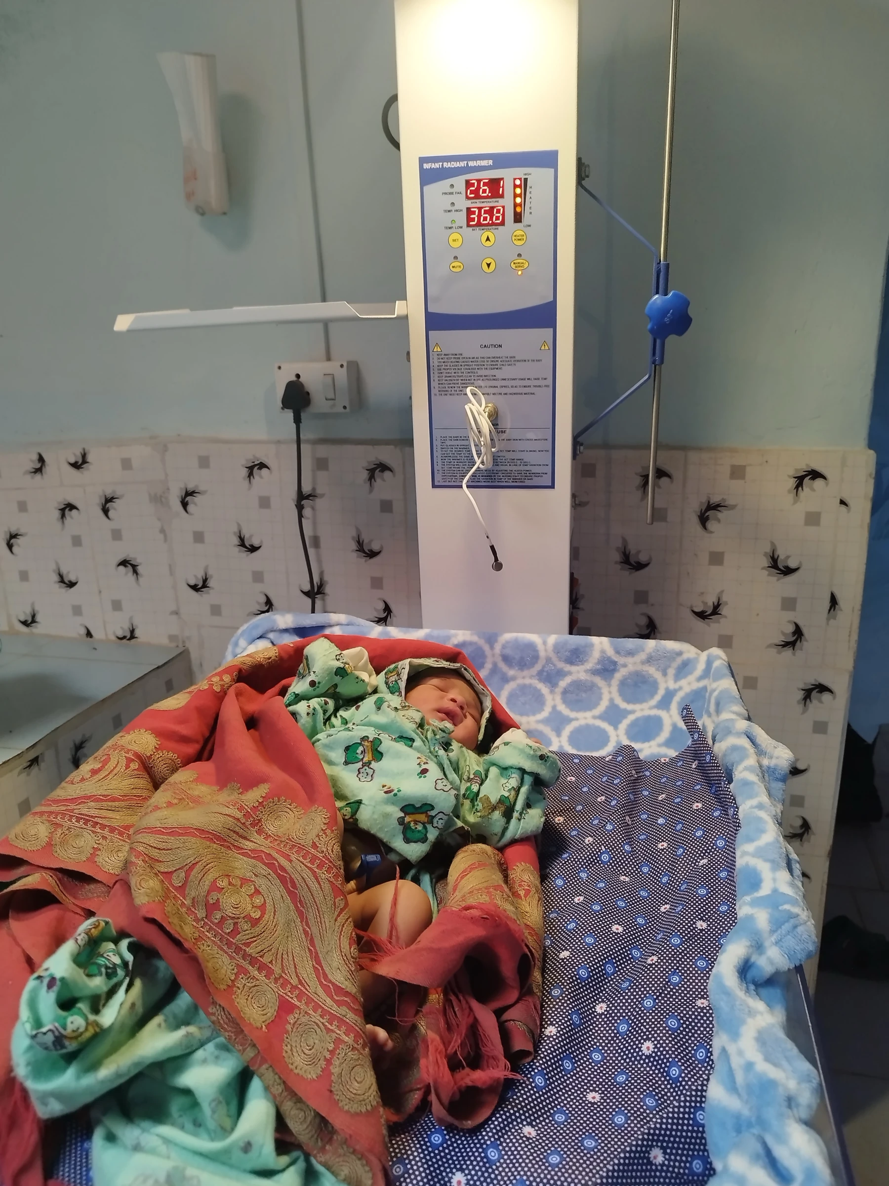 New born Baby Kept on Baby warmer